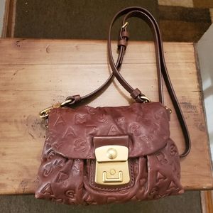 Marc Jacob's signature brown leather crossbody